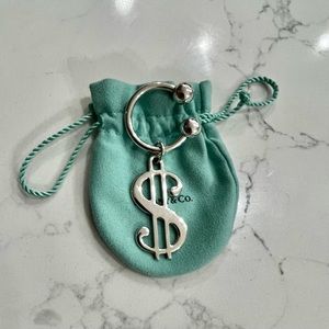 Tiffany & Co. Sterling Silver Dollar Sign Keychain with bag that is pictured